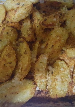 Una foto de Papas gratinadas con queso parmesano