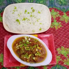 A picture of Beef Kaharra Masala With Boiled Rice.