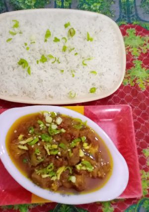 A picture of Beef Kaharra Masala With Boiled Rice.