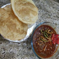 A picture of Spicy Chole bhature.
