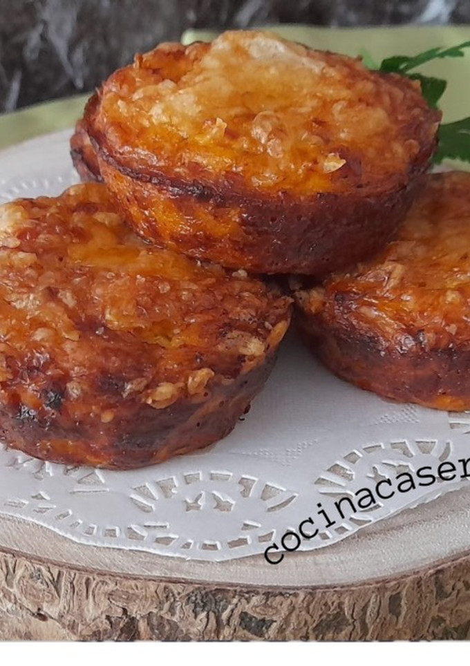 Una foto de Tartitas saladas de tomate y bacon