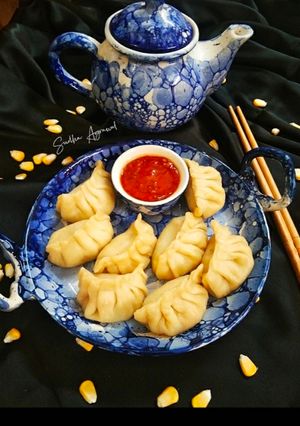 A picture of Momos with Corn and Veggies stuffing.