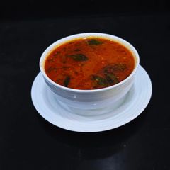 A picture of Tomato Rasam (Thakkali).