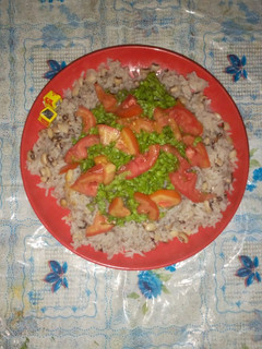 A picture of Rice and Beans with Salad.