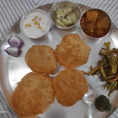 Dal Kachori with Aloo Kumdha Sabzi A picture of Dal Kachori with Aloo Kumdha Sabzi.