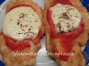 Una foto di mozzarella pollo cotolette