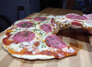 Una foto de Pizza al sartén