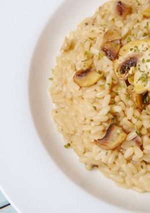 Una foto de Risotto de pollo con champiñones