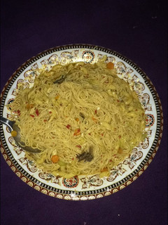 A picture of Macaroni and supergetti jollof.