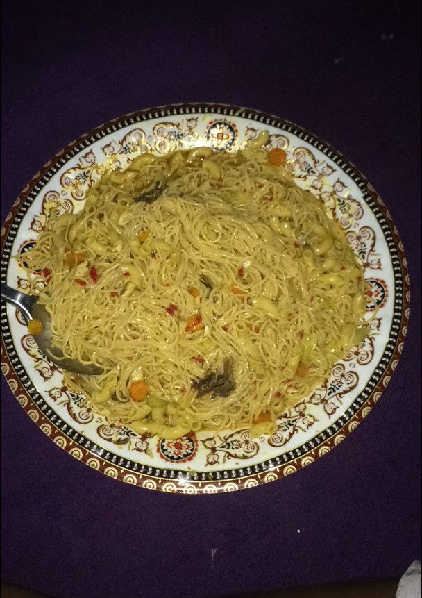 A picture of Macaroni and supergetti jollof.
