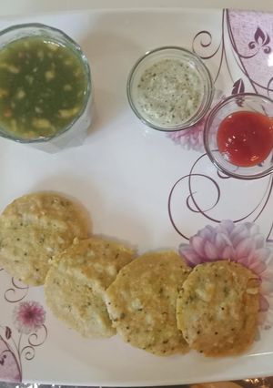 A picture of Moong dal stuffed veggie idli.
