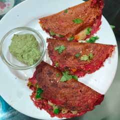 A picture of Beetroot pulp chilla with veggies.