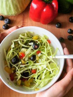 A picture of Cabbage salad with Peppers.