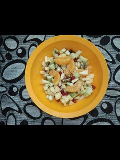 A picture of Mixed fruit and Cucumber salad.