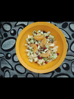 A picture of Mixed fruit and Cucumber salad.