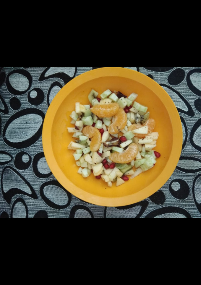 A picture of Mixed fruit and Cucumber salad.