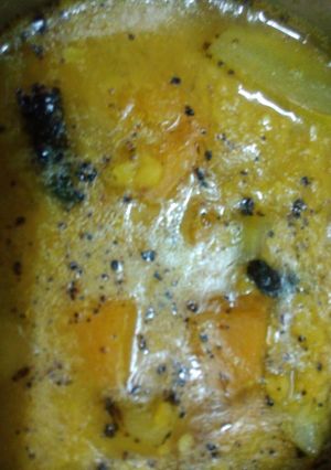 A picture of Moong daal with bottle gourd and pumpkin.