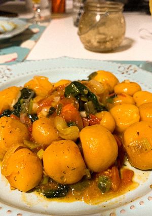 Una foto de Ñoquis de calabaza rellenos de queso