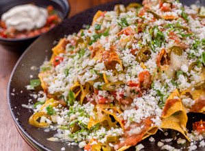 Una foto de Nachos Mexicanos