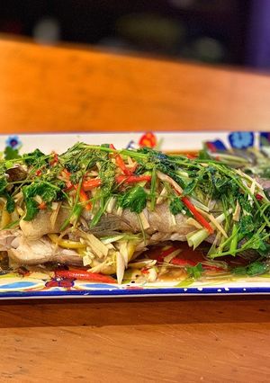 A picture of Steamed coral trout with ginger and shallot.