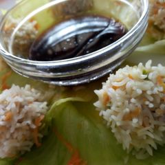 A picture of Chicken rice balls with soy dip.