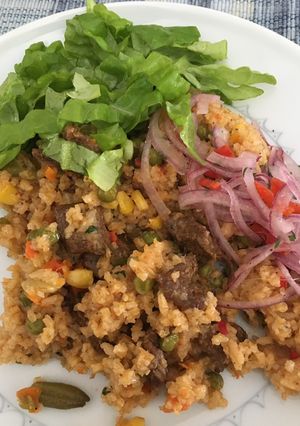 Una foto de Arroz con carne