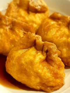 A picture of Egg Pouches Simmered in Broth.