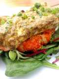 Roasted chermoula cod on a harrisa cauliflower steak