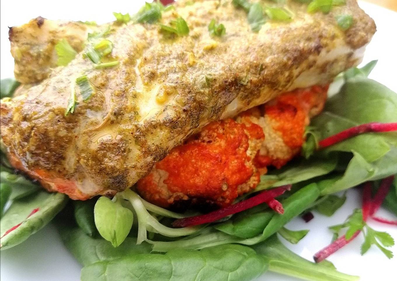 Roasted chermoula cod on a harrisa cauliflower steak
