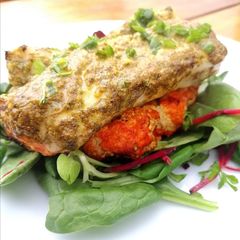 Roasted chermoula cod on a harrisa cauliflower steak A picture of Roasted chermoula cod on a harrisa cauliflower steak.