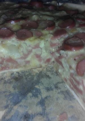 Una foto de Tarta de cebollas y salchichas