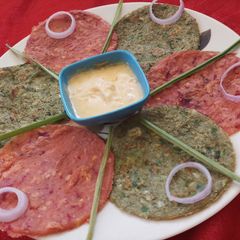 A picture of Beetroot and green garlic chilla.