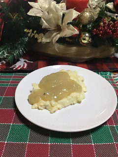 Una foto de Gravy para puré de papa