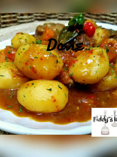 A picture of Chicken and potatoes soup.