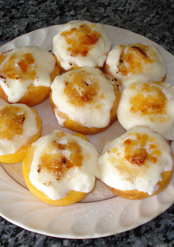Una foto de Melocotones al horno con queso dulce