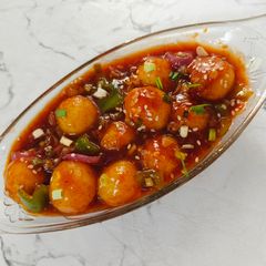 A picture of Chilli Garlic Potato Bites.