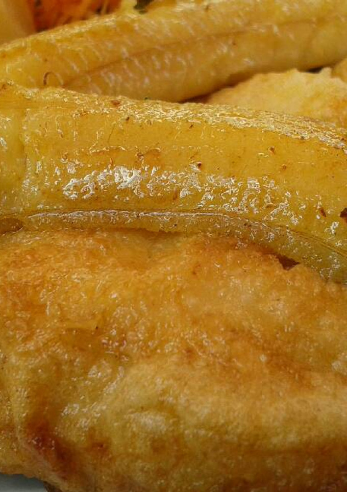 Una foto de Bifé de peixe espada con banana (pez sable con banana)