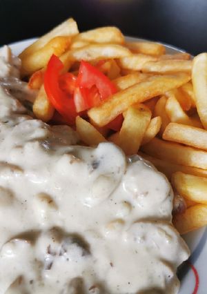 Gombás tejszínes karajszeletek recept fotója