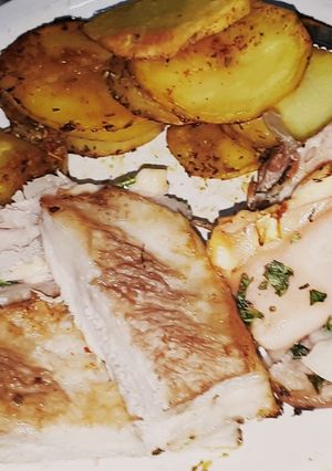 Una foto de Cerdo relleno con papas al horno