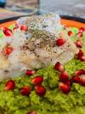 Merluzzo su crema di broccoli con chicchi di melograno