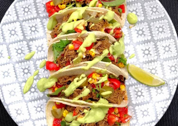 Pulled goose tacos with avocado sauce
