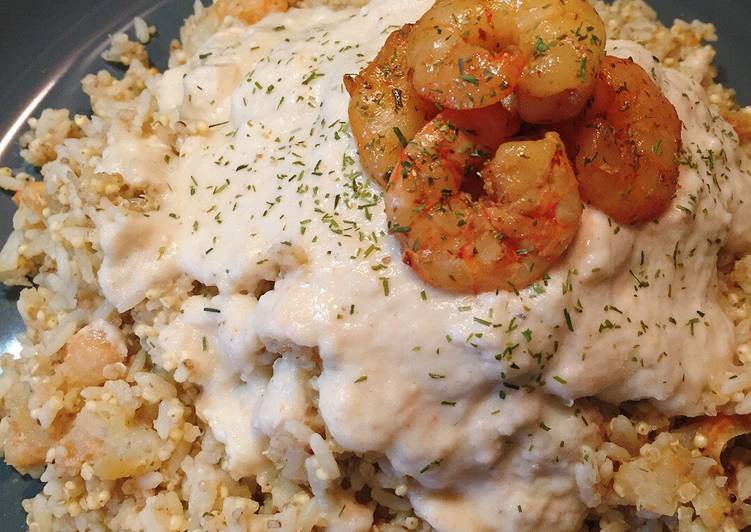 Mix di riso, miglio e quinoa con code di gambero speziate