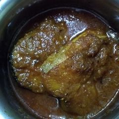 A picture of Fish curry (macher rosha).