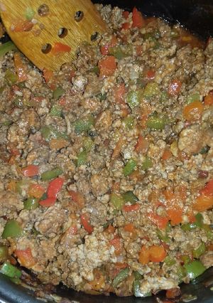 Una foto de Molida con pimientos