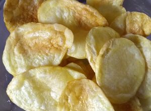 Una foto de Papas españolas en freidora con aire caliente