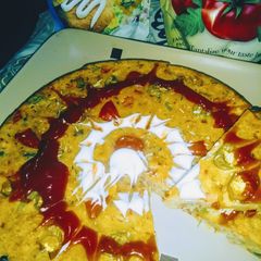 A picture of Pizza cake with leftover bbq chicken.