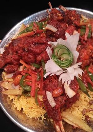 A picture of Lahori Mutton Chops with Zafrani rice.