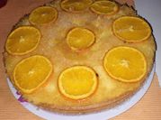 Una foto de torta invertida de naranjas