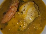 Una foto de guiso de patata con rape