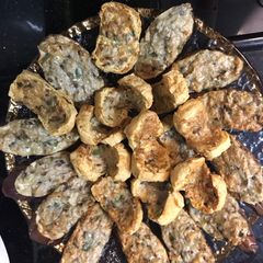 A picture of Stuffed meat fish eggplant and tofu.